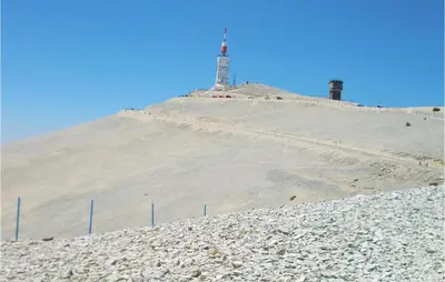 a lighthouse on top of a hill with a rocky hill at Stunning Home In Pernes-Les-Fontaines in Pernes-les-Fontaines
