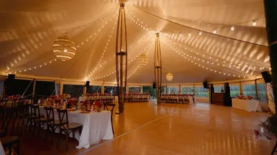 a tent with tables and chairs and lights at Studio Est - 30 m2 Domaine viticole Château Barbebelle - Jardin & Boulodrome partagés in Rognes