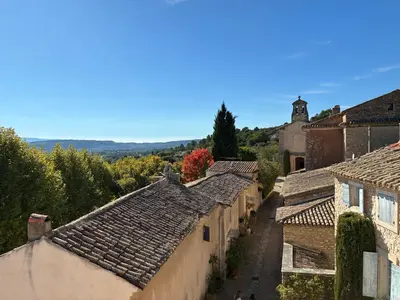 an aerial view of a village with roofs at Magic views in paradise in Joucas