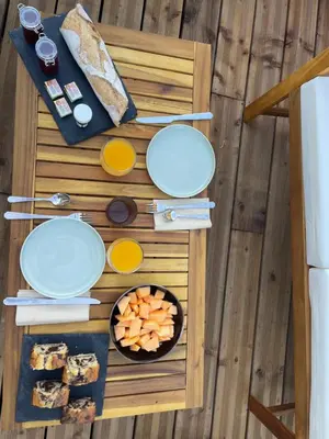 an overhead view of a table with food on it at Chambre d'hôtes avec Jacuzzi Ventoux Cocoon in Bédoin