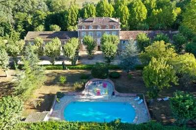 an aerial view of a house with a swimming pool at Notre Dame des Anges DUPLEX in Rustrel