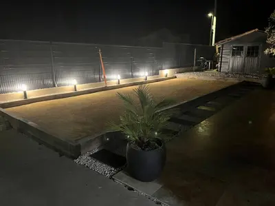 a plant in a pot on a patio at night at La villa castellas in Carpentras