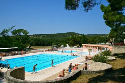 a group of people in a swimming pool at Chez Fanny in Bédoin
