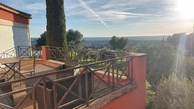 a balcony with a view of the countryside at Appartement entier Vue sur PAYS D Aix in Aix-en-Provence