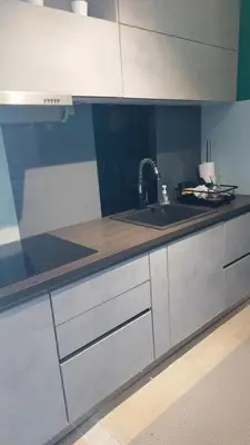 a kitchen with a sink and a counter top at Appartement entier Vue sur PAYS D Aix in Aix-en-Provence