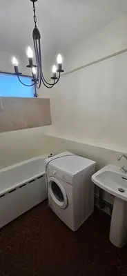 a bathroom with a toilet and a sink and a mirror at Joli apparemment Attention un dégât des eaux en plafonds des WC et salle de bain mais tout fonctionnelle in Salon-de-Provence