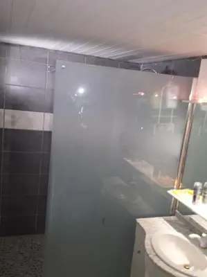 a bathroom with a shower and a toilet and a sink at Location provence ventoux sault in Sault-de-Vaucluse