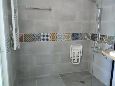 a bathroom with a shower with a sink and a shower at Le mas de la joëlette in Vedène