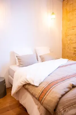 two beds sitting next to each other in a bedroom at La Maison des Lamanon in Salon-de-Provence