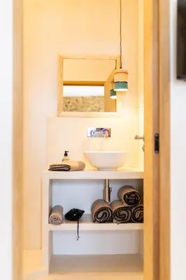 a bathroom with a sink and a mirror at La Maison des Lamanon in Salon-de-Provence