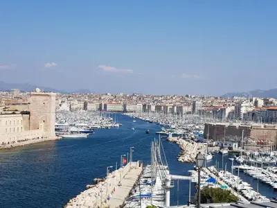 a view of a harbor with boats in the water at A l'Orée du Pin in Puyricard