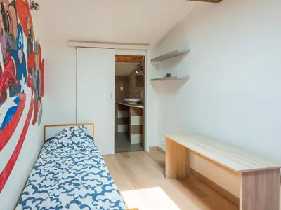 a small room with a bench and a closet at Holiday Home in Vaucluse near Mont Ventoux in Pernes-les-Fontaines