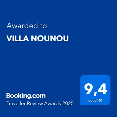 a blue sign with the text awarded to vla nirow at VILLA NOUNOU in Le Thor