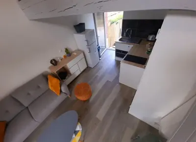 an overhead view of a kitchen and a living room at adorable guest house avec jardin et parking privatif in Aix-en-Provence