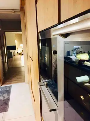 a kitchen with an open door to a kitchenasteryasteryasteryasteryasteryasteryastery at villa entre st rémy de provence et avignon in Noves