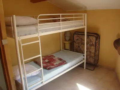 a bunk bed room with two bunk beds in it at vacances en provence olivier in Mormoiron