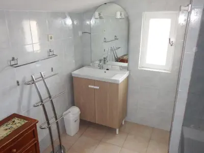 a bathroom with a sink and a shower and a toilet at vacances en provence olivier in Mormoiron