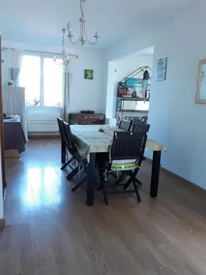 a dining room with a table and chairs at Lumière de Provence in Mollégès