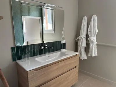 a bathroom with a sink and a mirror at CABADOL - Appartement Aix centre historique - très calme - 50m cours Mirabeau in Aix-en-Provence