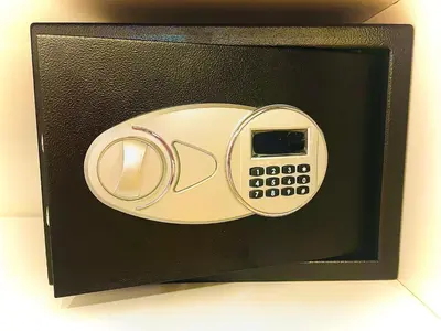 a remote control in a black box on a counter at L’Écrin in Aix-en-Provence