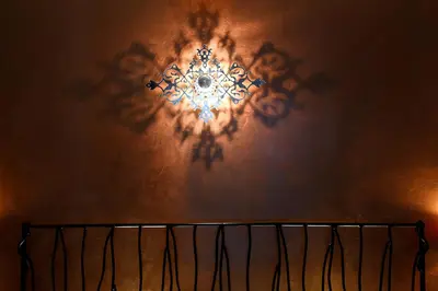 a wall with a mandala design on a wall at Une Parenthese pour Deux in Plan-dʼOrgon