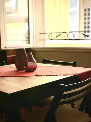 a pair of shoes sitting on top of a table at Appartement Le Provençal in Aix-en-Provence