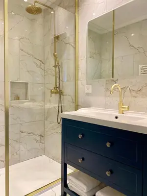 a bathroom with a sink and a shower at Cigale de Gordes in Gordes