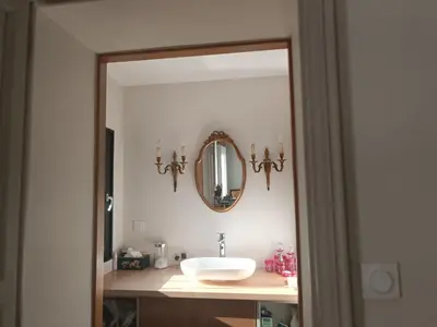 a bathroom with a sink and a mirror at Le mas de l'Auzon in Carpentras