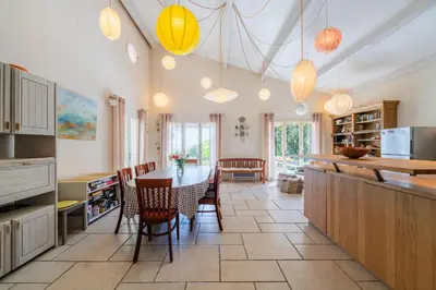 a living room with a ping pong table in the middle at Villa sur 1 hectare 15 Personnes GORDES & ROUSSILLON in Croagnes