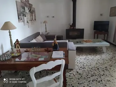 a living room with a couch and a coffee table at La maison de Nazig in Pertuis