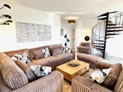 a living room with two couches and a coffee table at provence living in Roussillon