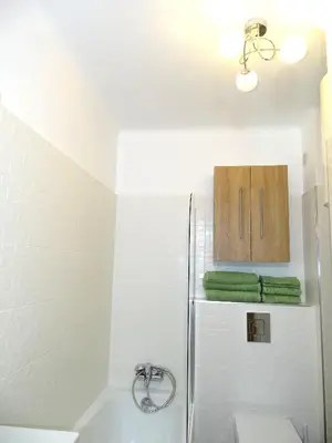 a kitchen with a refrigerator and a sink at TILIA JOURDAN-Studio Cosy Aix Centre-Cours MIRABEAU-PARKING-WIFI-SMART TV-RUE CALME in Aix-en-Provence