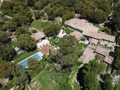 an aerial view of a mansion with a pool and trees at Villa Hautvallon - Peaceful Escape in Provence in Gordes