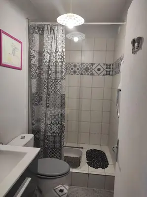 a small bathroom with a shower and a toilet at Au petit Florian en Provence in Apt