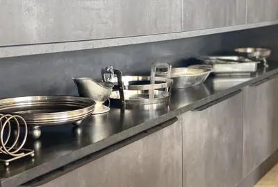 a group of pans on a counter in a kitchen at Mas La Rose Sauvage - magnificent Luberon views in Murs