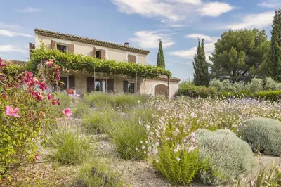a garden with flowers in front of a house at Mas de Lavande in Saint-Rémy-de-Provence