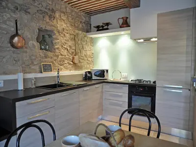 a kitchen with a sink and a stove at Bliss Near Aix-en-Provence in Venelles