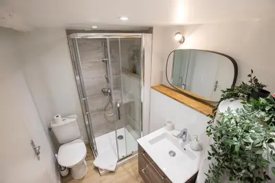 a bathroom with a shower and a toilet and a sink at La Venise Provençale - Hypercentre - Wifi in LʼIsle-sur-la-Sorgue