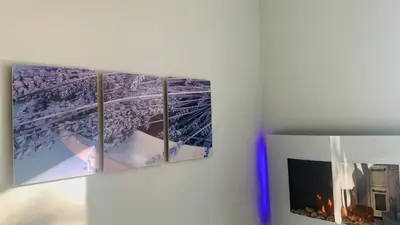 three pictures of the eiffel tower on a wall at La Belle Lumière in Saint-Saturnin-les-Apt