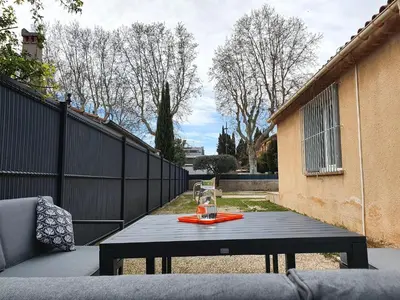 a black table with a drink on top of it at Villa Tassigny in Aix-en-Provence