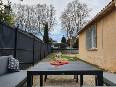 a black table with a drink on top of it at Villa Tassigny in Aix-en-Provence