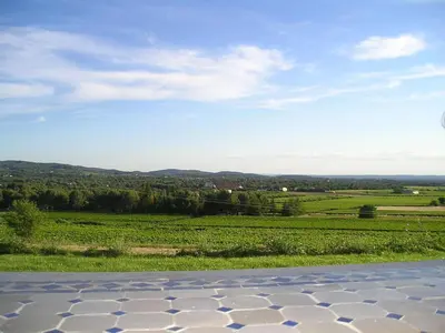 a view of a field and aphalt road at Masmazan in Mazan