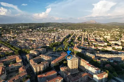 an aerial view of a city with buildings at Aix Rooftop Appartement T2 Luxe 5 étoiles - hypercentre Rotonde - Terrasse - Vue - Parking in Aix-en-Provence