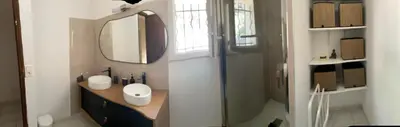 a bathroom with a sink and a mirror at LA BASTIDETTE PROVENçALE in Jouques