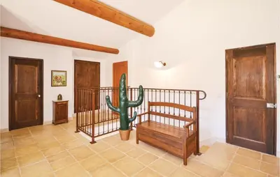 a room with a cactus in the middle of it at Cozy Home In Apt With Wifi in Apt
