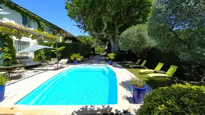 a swimming pool in the yard of a house at Mas de St-Andiol in Cabannes