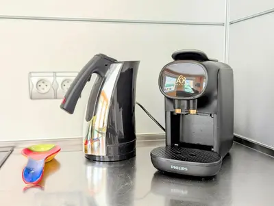 a coffee maker sitting on top of a kitchen counter at L'Escargolette - Incroyable maison de vacances 4 étoiles in Carpentras