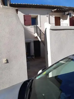 a car parked in front of a building at Le gîte d'églantine in Eyguières