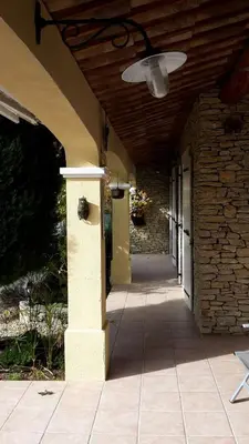 a building with a ceiling and a walk way at Provence Vaucluse Ventoux Villa Caromb in Caromb