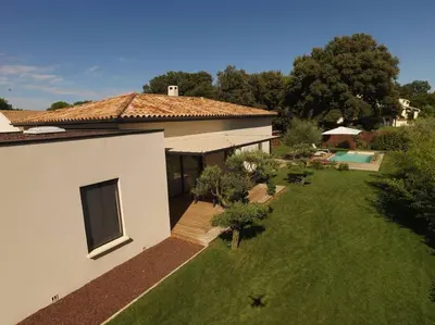 an aerial view of a house with a yard at 3 bedrooms new house with heated swimming pool in Carpentras
